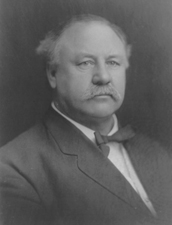 Governor Ralston, a mustached middle aged man