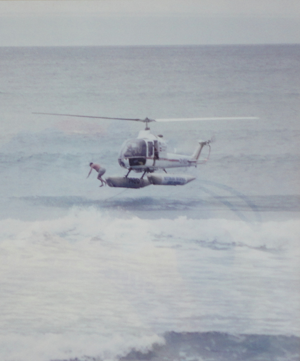 Prime Minister of New Zealand doing as Surf Jump at Piha