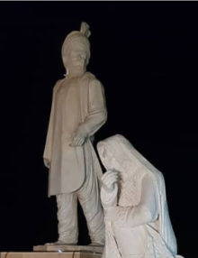 Statue of a Baloch man and woman with Balochi clothing - Zahedan