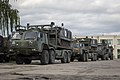 Lithuanian trucks transporting M113s for Ukraine due to the 2022 Russian invasion