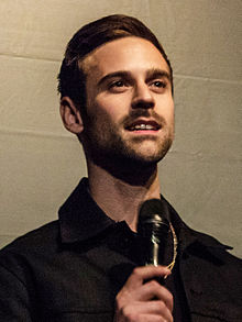 Lewis performing in 2013