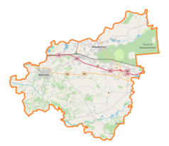 Mapa konturowa powiatu wielickiego, po lewej znajduje się punkt z opisem „Cmentarz Komunalny w Wieliczce”