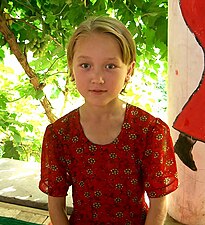 An Uyghur girl - a natural blond with epicanthic fold in Xinjiang, China.