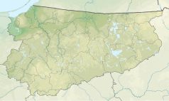 Mapa konturowa województwa warmińsko-mazurskiego, na dole po lewej znajduje się punkt z opisem „źródło”, powyżej na lewo znajduje się również punkt z opisem „ujście”