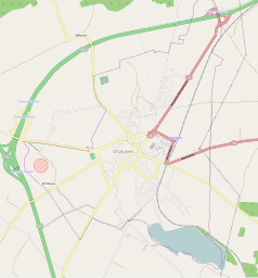 Mapa konturowa Olsztynka, w centrum znajduje się punkt z opisem „Dom Mrongowiusza w Olsztynku”