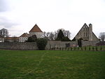 La grange, son pigeonnier et une partie du corps de logis.