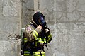 A firefighter in Toronto, Canada wears a Nomex hood in 2007.
