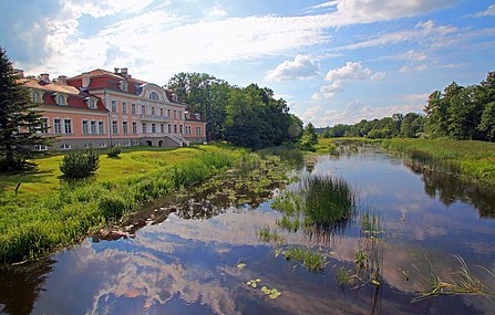 The river as it flows past the manor house in Laupa