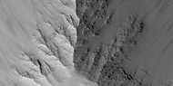 Close view of layers in Louros Valles, as seen by HiRISE under HiWish program. Note this is an enlargement of a previous image.