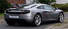 Rear-three-quarters view of a silver sports car