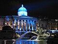 Image 13 National Gallery Photo credit: Michael Reeve The National Gallery at night, illuminated for an event to promote the launch of a Pepsi commercial. The National Gallery in London is an art gallery designed by William Wilkins. It holds part of the National Collection, particularly Western European art from 1250 to 1900. The collection of 2300 paintings belongs to the British public. More featured pictures