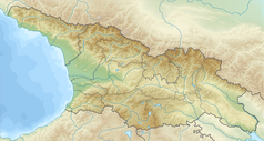 Mapa konturowa Gruzji, po prawej znajduje się czarny trójkącik z opisem „Tebulos Mta”