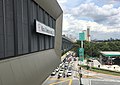 Station signage with Persiaran Surian below.