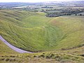 View from the White Horse, looking towards the burial ground by the wind turbines of Westmill Wind Farm in the distance