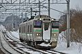 A 733 series EMU on the Chitose Line, February 2014