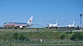 Airplanes taxiing to the runway