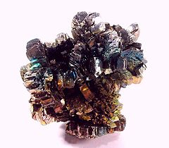 Iridescent marcasite. Kansas, U.S.A. Photo by Rob Lavinsky, iRocks.com – CC-BY-SA-3.0.