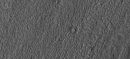 HiWish计]下高分辨率成像科学设备显示的伊斯墨诺斯湖区位于一座陨石坑坑底上的环模陨坑。
