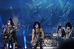 Kiss onstage in 2013 @ Hellfest. From left to right: Gene Simmons, Paul Stanley, Eric Singer and Tommy Thayer.