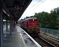 KCRC EMD G12, No.55 (R. D. Walker), at Tai Po Market Station, Hong Kong, June 2000.