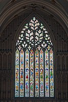 The west window (1338–39), with curvilinear tracery in the Decorated style