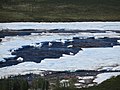 Ausgedehnte Aufeisfläche in einem breiten Tal, kanadische Arktis