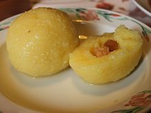 Potato dumplings filled with toasted white bread dices