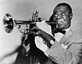 Image 5 Louis Armstrong Photo credit: New York World-Telegram and Sun Louis Armstrong, nicknamed "Satchmo" or "Pops", was an American jazz trumpeter and singer. Armstrong was a foundational influence on jazz, shifting the music's focus from collective improvisation to solo performers. With his distinctive gravelly voice, Armstrong was also an influential singer, demonstrating great dexterity as an improviser and as a scat singer. More selected pictures