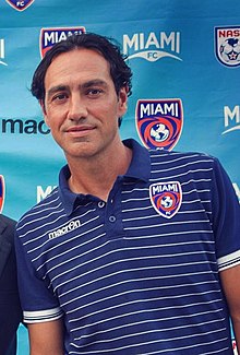 A smiling Alessandro Nesta posing for a photo