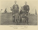 Team photograph of a rifle shooting team, in black and white.