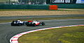 Lewis Hamilton alongside Rubens Barrichello, at the Chinese Grand Prix