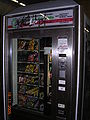 A vending machine selling crisps (potato chips), sweets and chocolate
