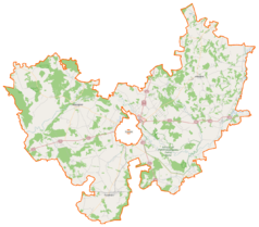 Mapa konturowa powiatu łomżyńskiego, blisko centrum po lewej na dole znajduje się punkt z opisem „Chojny-Naruszczki”