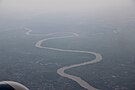 View of the river at the border of Thủ Dầu Một and Củ Chi district