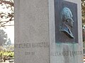 Hamilton's grave monument (closeup). The image is of his father.