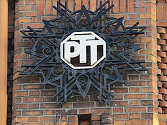 Logo of the French PTT on a former post office in Lille.