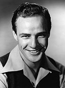 Black and white photo of Marlon Brando in the film, A Streetcar Named Desire in 1948