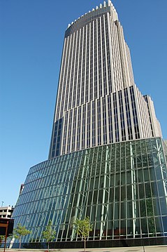 Image of the First National Bank Tower's 60 ft glass wall, with the winter garden inside
