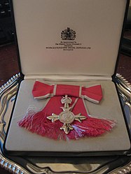 Badge as awarded to a female MBE