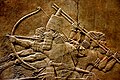 Image 237th-century BC relief depicting Ashurbanipal (r. 669–631 BC) and three royal attendants in a chariot (from Culture of Iraq)