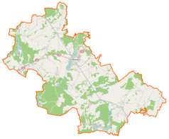 Mapa konturowa powiatu wolsztyńskiego, po lewej nieco u góry znajduje się punkt z opisem „Pomnik czerwonoarmisty w Siedlcu”