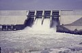 Flow of water through four openings in the Kainji Dam, 1970–1973.