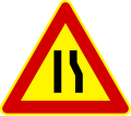 Road narrows on right