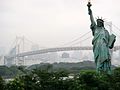 Replica Statue of Liberty with the Rainbow Bridge