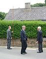 Members of the Roads Committee inspect an encroaching hedge