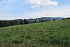 Blick von Dalherda nach Südosten: Bremerkopf (links), Ottersteine (mittig) und Dammersfeldkuppe (rechts)