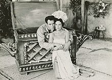 Paul Valentine and Eva Gabor in Love Island (1952)