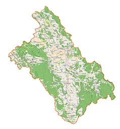 Mapa konturowa powiatu kłodzkiego, blisko centrum u góry znajduje się punkt z opisem „Dwór w Ścinawce Dolnej”