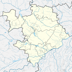 Mapa konturowa powiatu staszowskiego, blisko centrum na lewo u góry znajduje się punkt z opisem „Zagrody”