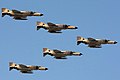 Formation en V de F-4 Phantom de la Force aérienne de la République islamique d'Iran.
